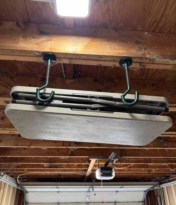 9 Extra Seating and Folding Table Storage Ideas for Holiday Hosting 10 Hang the Folding Table from Garage Ceiling Joists – folding chair storage
